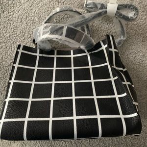 Brand new “ black and white bag”